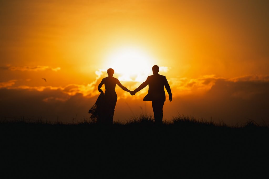 Sunset silhouette of bride and groom; Bendooley Estate, Southern Highlands Wedding Photographer