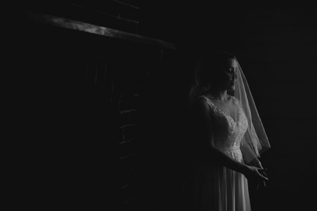 Moody black and white image of a bride at her Burnham Grove Wedding; Southern Highlands Wedding photographer