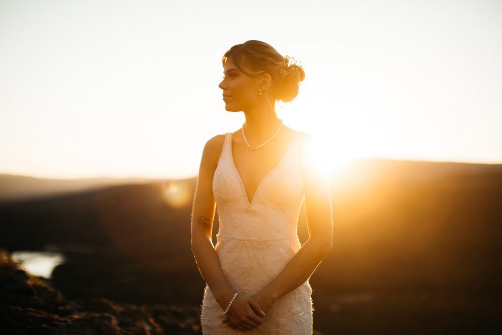 bride highlighted by the setting sun; Kangaroo Valley Bush Retreat Wedding Photography