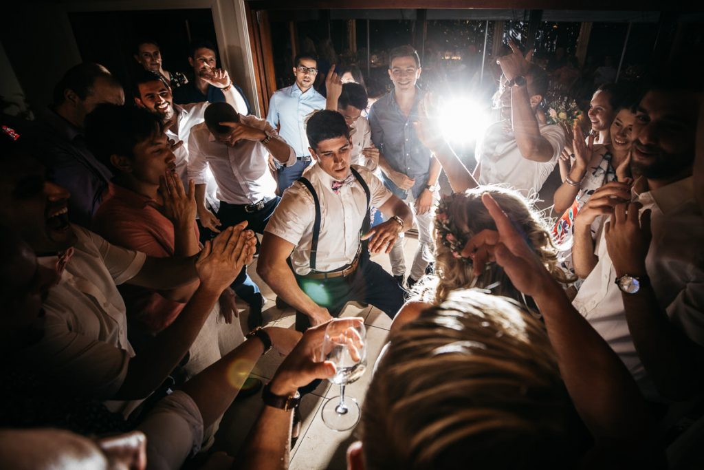 Groom gets down to boogie cicled by guests at his wedding at Kangaroo Valley Bush Retreat; South Coast Wedding Photographer
