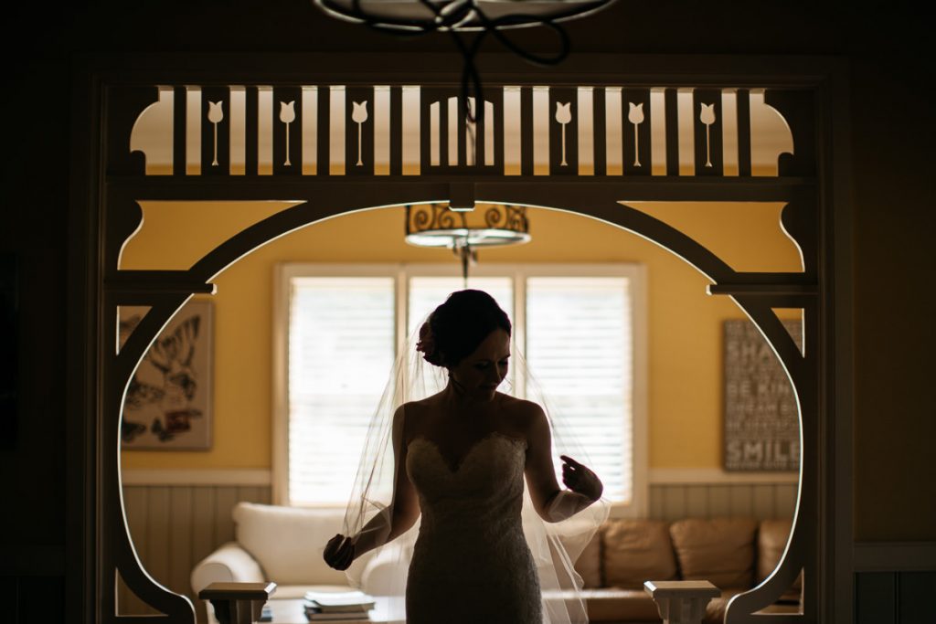 Bride straightens her weil; Melross - South Coast Wedding Photographer - Kangaroo Valley