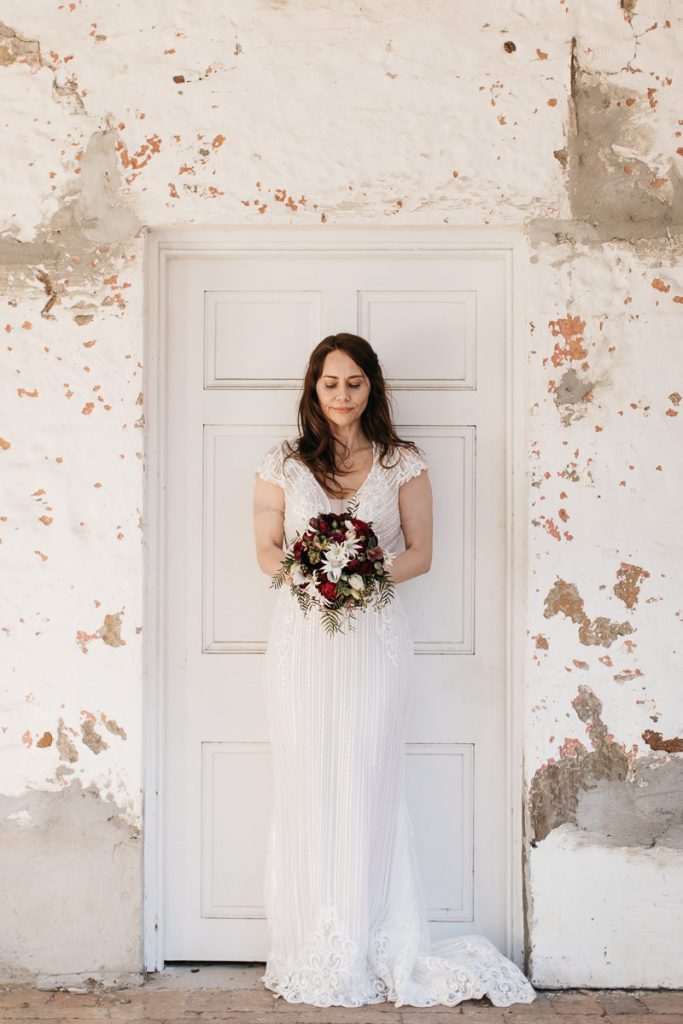 Potrait of a bride in a rustic doorway; Southern Highlands Bowral Wedding Photographer